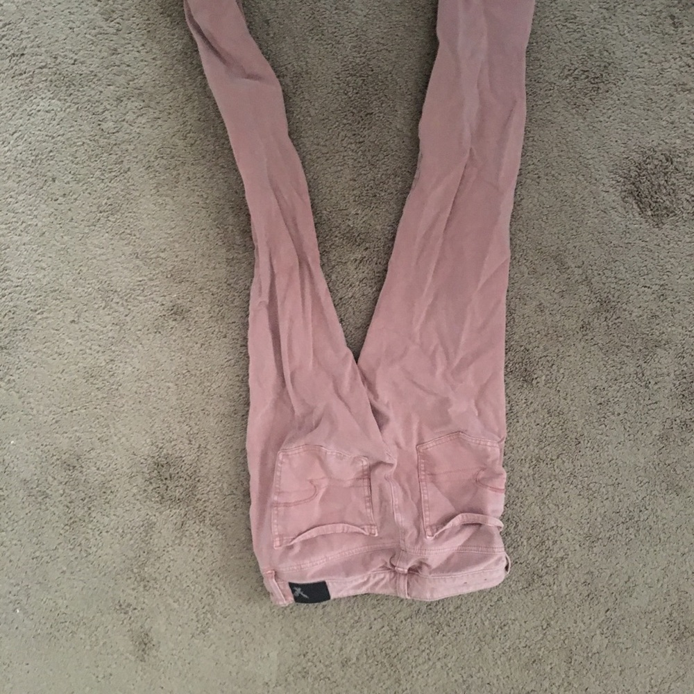 Light pink skinny jeans